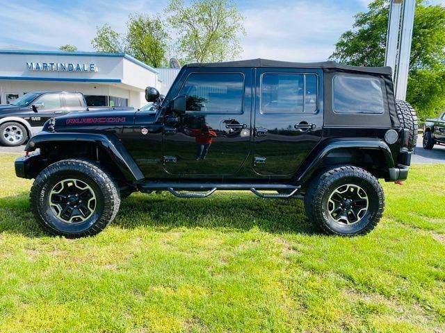Used 2016 Jeep Wrangler Unlimited Rubicon with VIN 1C4HJWFG2GL331730 for sale in New Madrid, MO