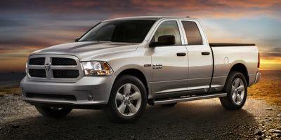2014 RAM 1500 4WD Quad Cab 6.4 Ft Box Laramie